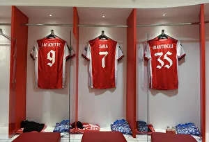 Arsenal's Pre-Match Focus: Lacazette, Saka, and Martinelli's Shirts in the Changing Room before Carabao Cup Semi-Final vs Liverpool