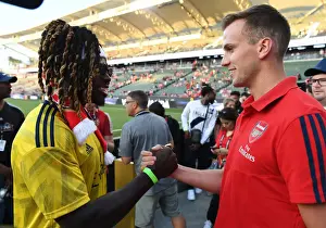 Arsenal's Pre-Season Encounter with Bayern Munich in Los Angeles: Rob Holding and Jay Ajayi Share a Moment