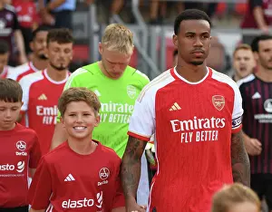 Arsenal's Pre-Season Kickoff: Gabriel Leads the Team Out Against FC Nurnberg, Germany (2023)