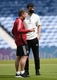 Arsenal's Pre-Season Showdown at Ibrox: Tom Smith and Inaki Cana in Deep Conversation Before the Rangers Face-Off