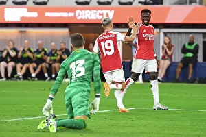 Arsenal's Pre-Season Victory: Trossard and Saka Celebrate Four Goals Against FC Barcelona (2023)