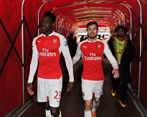Arsenal's Premier League Victory: Welbeck and Ramsey Celebrate with the Trophy (2015-16)
