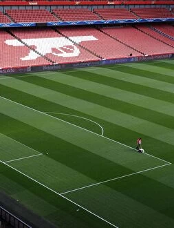 Images Dated 25th February 2015: Arsenal's Prepared Emirates Stadium Pitch for Monaco Clash (2015)