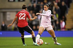 Images Dated 20th April 2023: Arsenal's Rafaelle Souza Fends Off Manchester United's Nikita Parris in FA Women's Super League