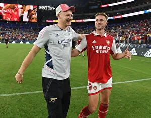 Images Dated 17th July 2022: Arsenal's Ramsdale and Holding: A Moment of Relief and Camaraderie Post-Match at M&T Bank Stadium