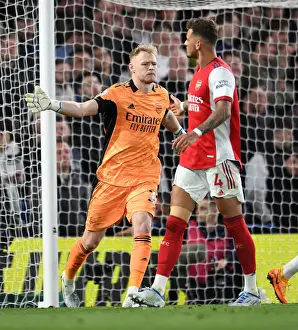 Arsenal's Ramsdale and White Celebrate Amidst the Action: Chelsea vs. Arsenal, Premier League 2021-22