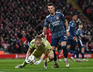 Arsenal's Ramsdale and White Lock Horns in Intense Carabao Cup Semi-Final Showdown Against Liverpool