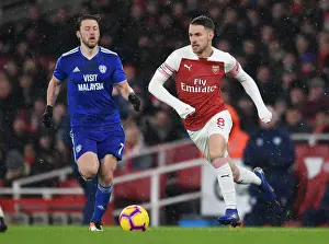 Arsenal's Ramsey Battles Arter in Premier League Clash vs. Cardiff City