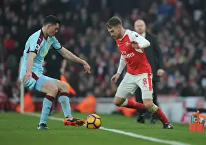 Arsenal V Burnley 2016-17 Prints: Arsenal's Ramsey Clashes with Burnley's Keane in Premier League Showdown