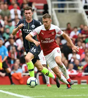 Arsenal V Manchester City 2018-19 Prints: Arsenal's Ramsey Clashes with Manchester City's Laporte in Premier League Showdown