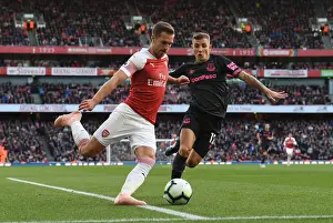 Arsenal V Everton 2018-19 Prints: Arsenal's Ramsey Faces Off Against Everton's Digne in Premier League Clash