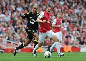 Arsenal V Bolton Wanderers 2011-12 Prints: Arsenal's Ramsey Outmaneuvers Bolton's Pratley in 2011-12 Premier League Clash