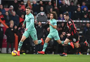 AFC Bournemouth V Arsenal 2018-19 Prints: Arsenal's Ramsey Outmaneuvers Bournemouth's Cook in Premier League Clash