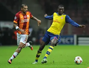 Galatasaray V Arsenal 2014/15 Prints: Arsenal's Ramsey Outmaneuvers Galatasaray's Melo in Champions League Clash