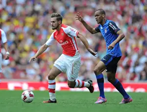 Arsenal V AS Monaco 2014-15 Prints: Arsenal's Ramsey Outmaneuvers Monaco's Fabinho in Emirates Cup Clash