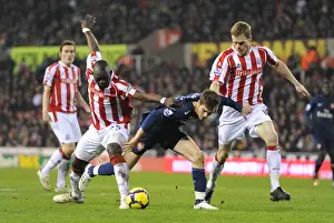 Arsenal's Ramsey Scores Twice as Gunners Overpower Shawcross and Faye's Stoke