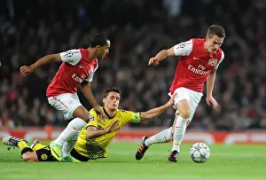 Arsenal V Borussia Dortmund 2011-12 Prints: Arsenal's Ramsey and Walcott vs Dortmund's Kehl: A Battle in the 2011-12 Champions League