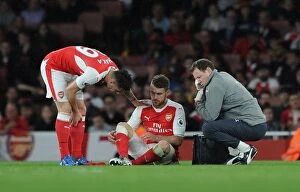 Images Dated 16th May 2017: Arsenal's Ramsey and Xhaka Consulting Team Physio Lewin During Arsenal v Sunderland Match