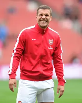 Arsenal V Aston Villa 2013-14 Prints: Arsenal's Ready Striker: Lukas Podolski Gears Up Against Aston Villa (2013-14)