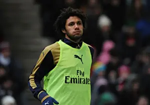 Stoke City V Arsenal 2015-16 Prints: Arsenal's Ready Substitute: Mohamed Elneny Awaits His Premier League Debut against Stoke City