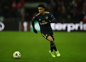 Standard Liege V Arsenal 2019-20 Prints: Arsenal's Reiss Nelson in Action against Standard Liege in UEFA Europa League (December 2019)