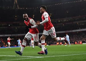 Images Dated 7th January 2020: Arsenal's Reiss Nelson and Alexandre Lacazette Celebrate Goal Against Leeds United in FA Cup Third