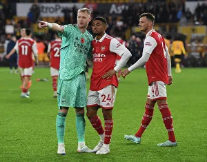 Arsenal's Reiss Nelson, Ben White, and Aaron Ramsdale Celebrate Victory over Wolverhampton Wanderers in 2022-23 Premier League
