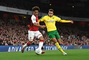 Arsenal V Norwich - Carabo Cup 4th Round 2017-18 Prints: Arsenal's Reiss Nelson Clashes with Norwich's Josh Murphy in Carabao Cup Showdown
