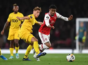 Arsenal's Reiss Nelson Clashes with Standard Liege's Mergim Vojvoda in Europa League Showdown