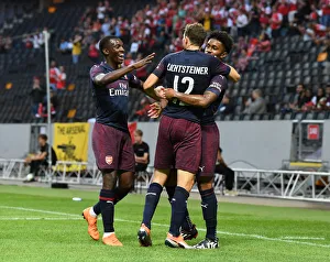 Arsenal's Reiss Nelson, Eddie Nketiah, and Stephan Lichtsteiner Celebrate Goal Against SS Lazio in 2018 Pre-Season Friendly