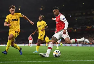 Arsenal's Reiss Nelson Goes Head-to-Head with Mergim Vojvoda in Europa League Showdown
