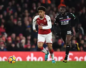 Arsenal V Crystal Palace 2017-18 Prints: Arsenal's Reiss Nelson Outmaneuvers Crystal Palace's Bakary Sako