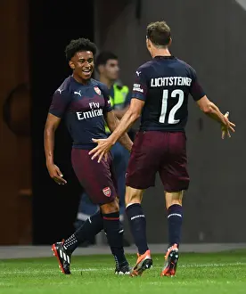 Arsenal's Reiss Nelson and Stephan Lichtsteiner Celebrate Goal Against SS Lazio in Stockholm Pre-Season Friendly, 2018