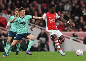 Arsenal's Rising Talents: Saka vs Thomas - A Premier League Battle at Emirates Stadium