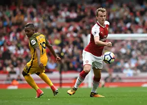 Arsenal's Rob Holding Battles Jose Izquierdo in Premier League Clash