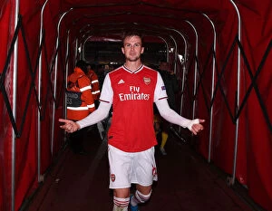 Images Dated 3rd October 2019: Arsenal's Rob Holding Celebrates after Europa League Victory over Standard Liege