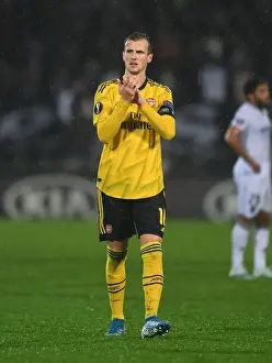Arsenal's Rob Holding Celebrates Europa League Victory with Fans