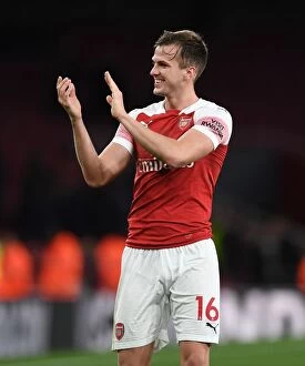 Images Dated 2nd December 2018: Arsenal's Rob Holding Celebrates with Fans after Derby Win over Tottenham