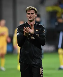 Arsenal's Rob Holding Celebrates with Fans after Europa League Victory over Bodø/Glimt