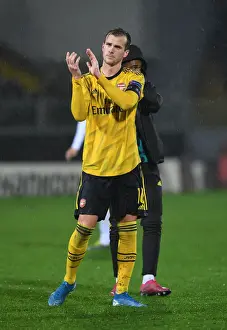 Arsenal's Rob Holding Celebrates with Fans after Europa League Victory over Vitoria Guimaraes
