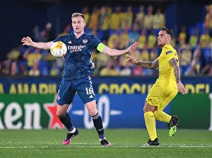 Villarreal V Arsenal 2020-21 Prints: Arsenal's Rob Holding Clashes with Paco Alcacer in UEFA Europa League Semi-Final Against Villarreal