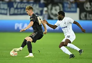 FC Zurich V Arsenal 2022-23 Prints: Arsenal's Rob Holding Clashes with Zurich's Tosin in Europa League Group A Match