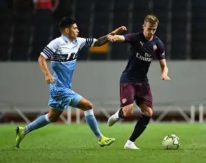 Arsenal V SS Lazio 2018-19 Prints: Arsenal's Rob Holding Outmaneuvers Lazio's Joaquim Correa in Stockholm Pre-Season Clash