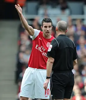 Arsenal V Tottenham 2011-12 Prints: Arsenal's Robin van Persie Argues with Referee Mike Dean during the Intense Arsenal v Tottenham Rivalry (2011-12)