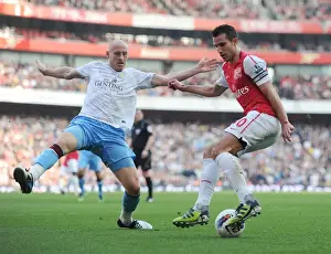 Arsenal's Robin van Persie Clashes with Aston Villa's James Collins in Premier League Showdown