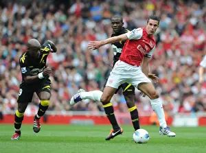 Arsenal V Bolton Wanderers 2011-12 Prints: Arsenal's Robin van Persie Faces Off Against Bolton's Fabrice Muamba and Nigel Reo-Coker