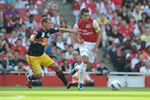Arsenal V New York Red Bulls 2011-12 Prints: Arsenal's Robin van Persie Faces Off Against Teemu Tainio of New York Red Bulls during the 2011-12 Emirates Cup