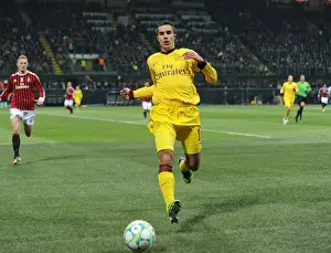 Arsenal's Robin van Persie Illuminates UEFA Champions League Showdown Against AC Milan (2011-12)