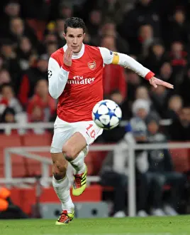 Arsenal's Robin van Persie Scores Brace in 3-1 UEFA Champions League Victory over Partizan Belgrade