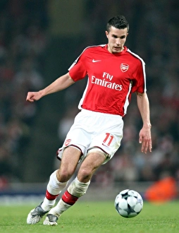 Arsenal's Robin van Persie Scores Hat-Trick: 3-0 Crushing Victory over Villarreal in UEFA Champions League Quarterfinals